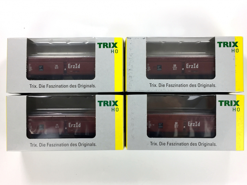 Bild 1 von H0 DC TRIX 24120 01-04 - 4-tlg. Set Selbstentladewagen Erz Id der DB - Ep. III