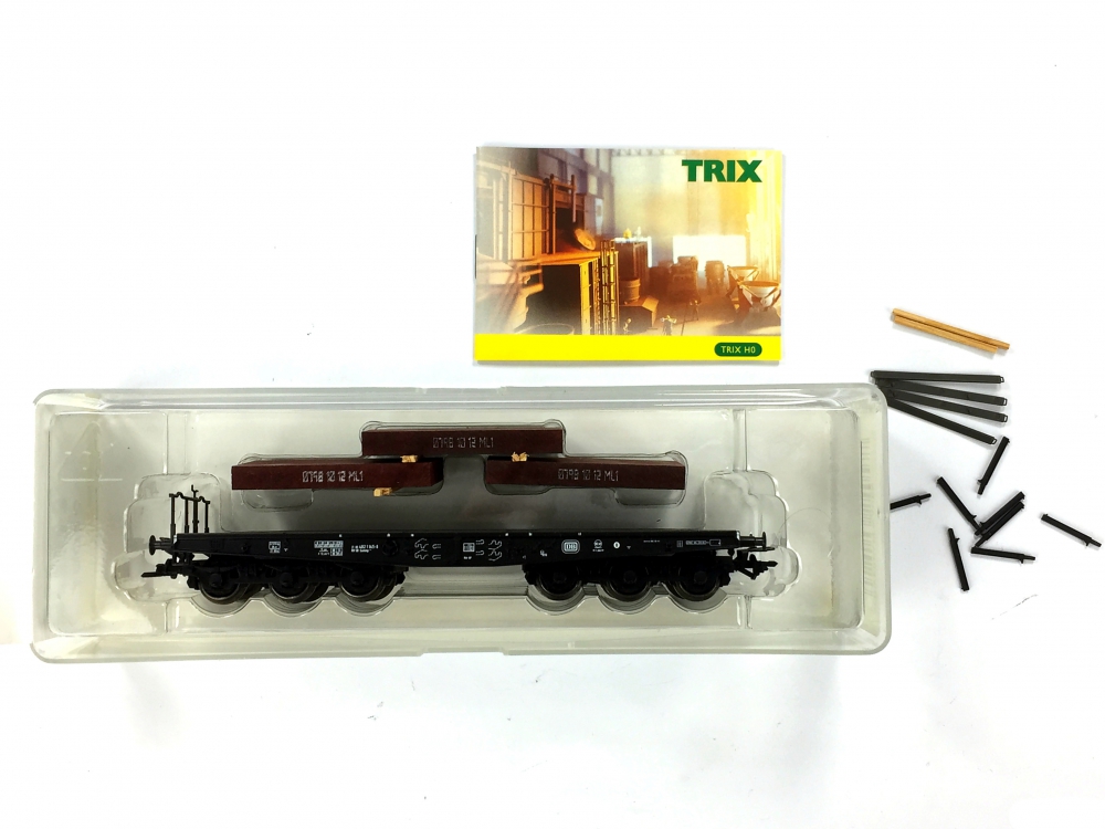 Bild 1 von H0 DC TRIX 24057 - Schwerlastwagen Flachwagen Sammp 705 der DB mit Stahlbrammen - Ep. IV